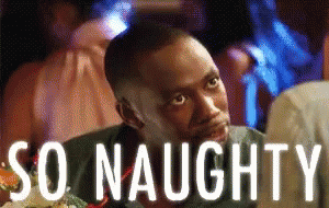 A Man Is Sitting At A Table With The Words So Naughty Written Above Him GIF