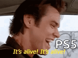 A Man Is Sitting In A Car Laughing And Saying `` It 'S Alive ! It 'S Alive ! `` GIF