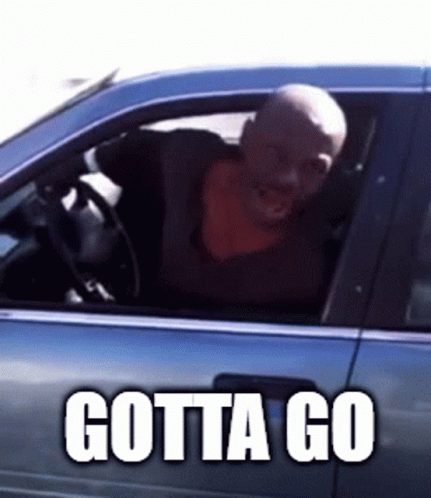 A Man Is Sitting In A Car With Gotta Go Written On The Side GIF
