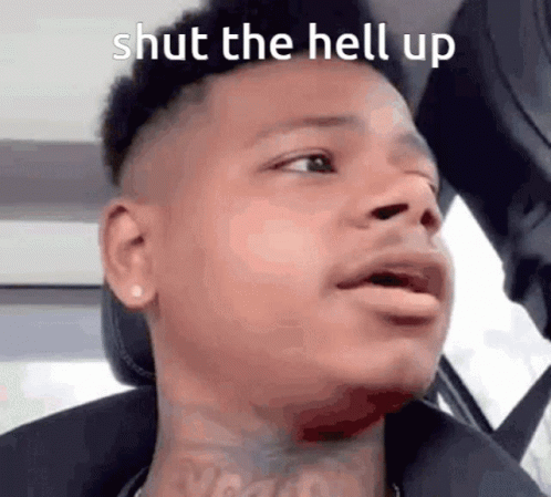 A Man Is Sitting In A Car With His Mouth Open And The Words `` Shut The Hell Up '' Written Above Him . GIF