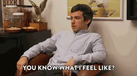 a man is sitting in a chair and saying " you know what i feel like "