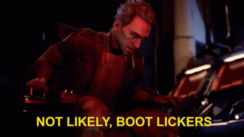 A Man Is Sitting In A Chair In A Dark Room With A Red Light Behind Him . GIF