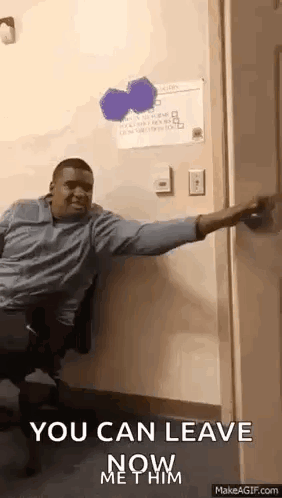 Man Sitting In Front Of Door With Arms Outstretched GIF