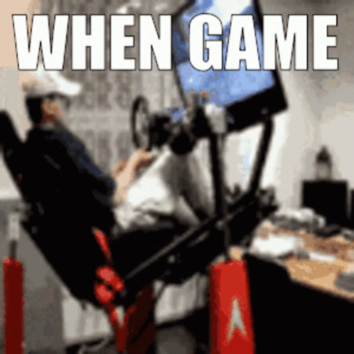 A Man Is Sitting In A Chair Playing A Video Game With The Words When Game Written Above Him GIF