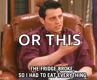 A Man Is Sitting In A Chair With A Pizza And A Fridge Broke . GIF