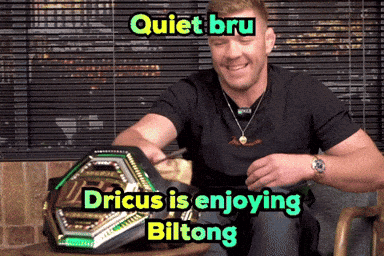 A Man Is Sitting In A Chair With A Ufc Belt On His Lap And The Caption Quiet Bru GIF