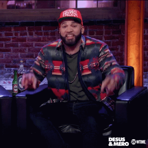 A Man Is Sitting In A Chair With His Arms In The Air And The Word Allegedly Is Surrounded By Other Words GIF