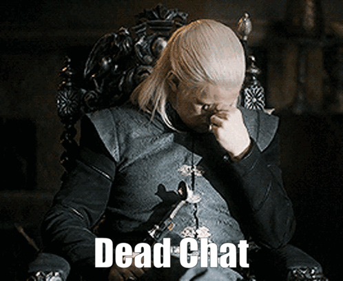 A Man Is Sitting In A Chair With His Hand On His Face And The Words Dead Chat Written Below Him GIF
