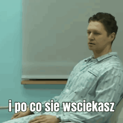 A Man Is Sitting In A Chair With I Po Co Sie Wsciekasz Written On The Bottom GIF