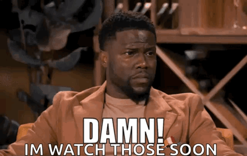 A Man Is Sitting In A Chair With The Words Damn Im Watch Those Soon On His Face GIF