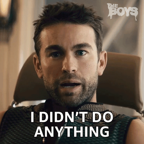 A Man Is Sitting In A Chair With The Words I Did N't Do Anything Behind Him GIF