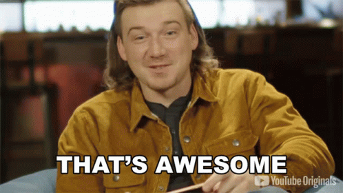 A Man Is Sitting In A Chair With The Words That 'S Awesome On The Bottom GIF