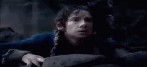 A Man Is Sitting In A Dark Room Asking What Have You Done . GIF
