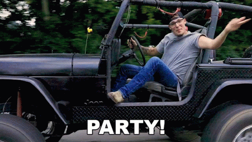 A Man Is Sitting In A Jeep With The Words Party Written On The Side GIF