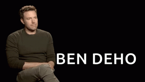 A Man Is Sitting In Front Of A Black Background That Says " I Agree Ben Deho " GIF