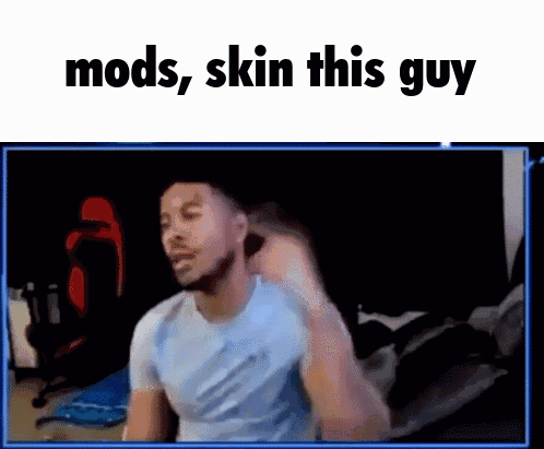 A Man Is Sitting In Front Of A Computer Screen With The Words Mods , Skin This Guy Above Him GIF