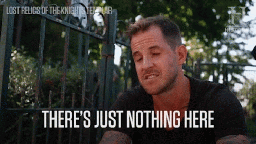A Man Is Sitting In Front Of A Fence With His Eyes Closed And The Words `` There 'S Just Nothing Here '' . GIF