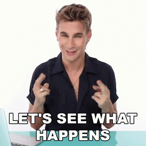 A Man Is Sitting In Front Of A Laptop And Says Let 'S See What Happens . GIF