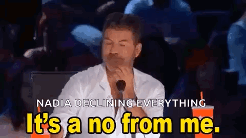 A Man Is Sitting In Front Of A Microphone With His Eyes Closed And Saying `` It 'S A No From Me . '' GIF