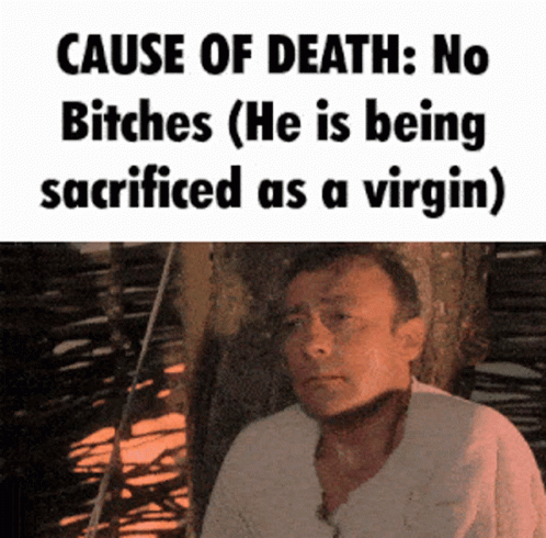 A Man Is Sitting In Front Of A Sign That Says Cause Of Death No Bitches ( He Is Being Sacrificed As A Virgin GIF