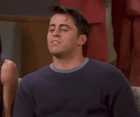 A Man Is Sitting In Front Of A Sign That Says There 'S Always Room For Jello . GIF