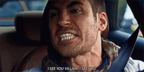 A Man Is Sitting In The Back Seat Of A Car And Saying `` I See You Villain I See You '' . GIF