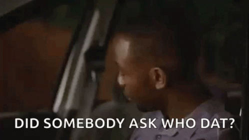 A Man Is Sitting In The Driver 'S Seat Of A Car . GIF