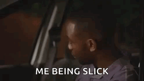 A Man Is Sitting In The Driver 'S Seat Of A Car With The Words `` Me Being Slick '' Written On The Screen . GIF