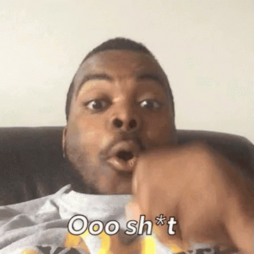 A Man Is Sitting On A Couch And Making A Funny Face With The Words Ooo Sh * T On The Bottom GIF