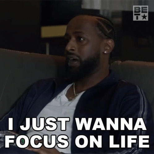 A Man Is Sitting On A Couch And Says I Just Wanna Focus On Life GIF