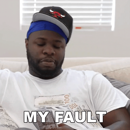 A Man Is Sitting On A Couch Holding A Pile Of Money And The Words My Fault Are Above Him GIF