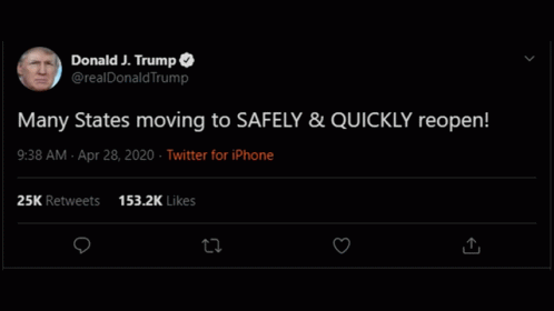 A Man Is Sitting On A Couch In A Living Room With A Lamp In The Background . GIF