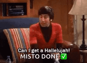 A Man Is Sitting On A Couch Talking About Getting A Hallelujah ! Misto Done . GIF