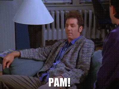 A Man Is Sitting On A Couch Talking To Another Man And Says Pam . GIF