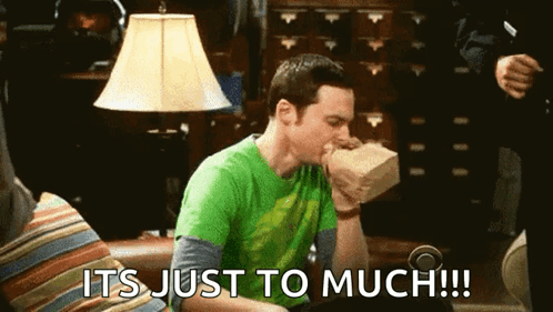 A Man Is Sitting On A Couch With A Bag In His Mouth And The Words It 'S Just To Much . GIF