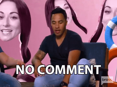 A Man Is Sitting On A Couch With The Word No Comment Written On The Bottom GIF