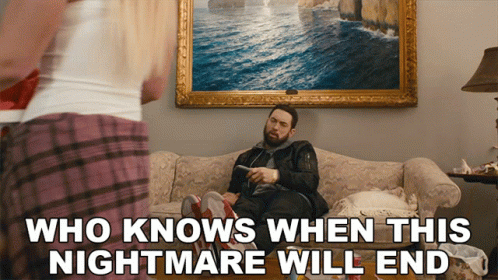 A Man Is Sitting On A Couch With The Words Who Knows When This Nightmare Will End GIF