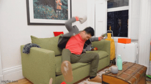 A Man Is Sitting On A Green Couch With His Arms Outstretched And The Url Imgflip.com Is Displayed Below Him GIF