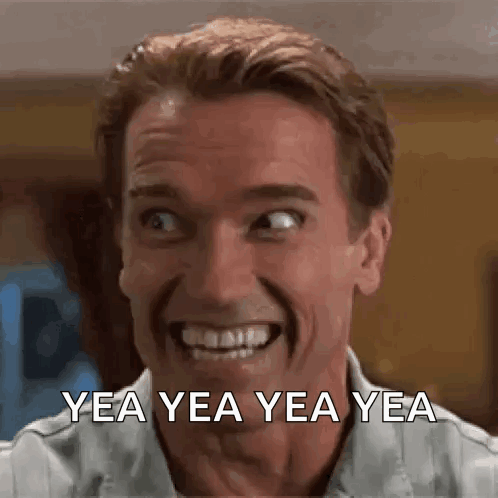 A Man Is Smiling And Making A Funny Face With The Words Yea Yea Yea Yea Written Below Him . GIF