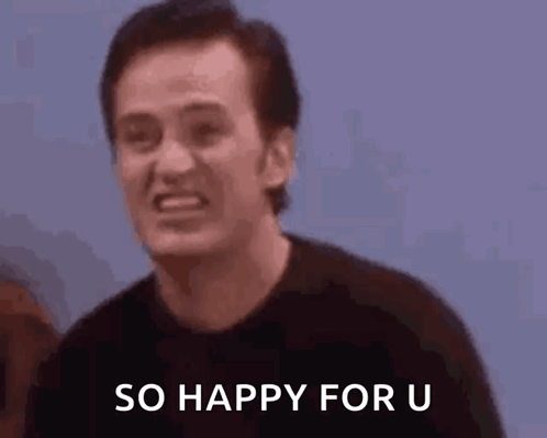 A Man Is Smiling And Saying `` So Happy For U '' While Standing In Front Of A Woman . GIF