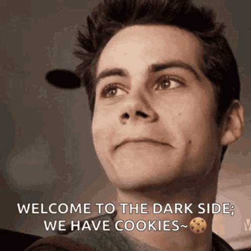 A Man Is Smiling And Saying Welcome To The Dark Side We Have Cookies .. GIF