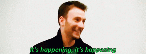 A Man Is Smiling And Says It 'S Happening GIF