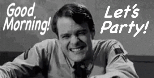 A Man Is Smiling In A Black And White Photo With The Words Good Morning Let 'S Party GIF