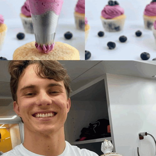 A Man Is Smiling In Front Of Cupcakes With Purple Frosting And Blueberries GIF