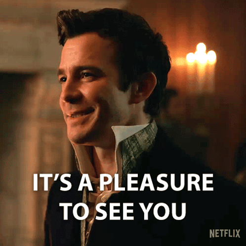 a man is smiling with the words " it 's a pleasure to see you " next to him