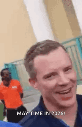 A Man Is Smiling With The Words May Time In 2026 On His Face . GIF