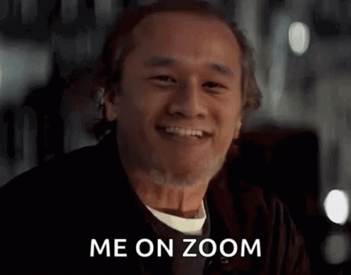 A Man Is Smiling With The Words Me On Zoom Below Him GIF