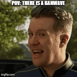 A Man Is Smiling With The Words Pov : There Is A Banwave On His Face GIF