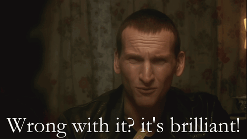 A Man Is Smiling With The Words Wrong With It It 'S Brilliant Below Him GIF