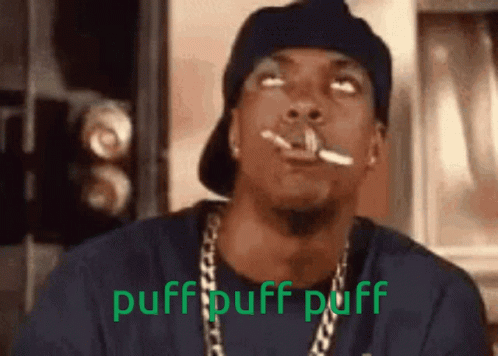 A Man Is Smoking A Cigarette With The Words Puff Puff Puff Written On The Bottom GIF